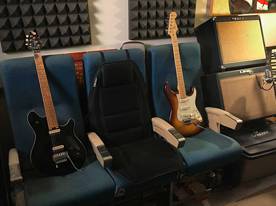 airplane seats, Peavey Wolfgang EVH, Fender American Deluxe Strat, Tech 21 Power Engine, Line6 Flextone, Alesis QS6, gig tub